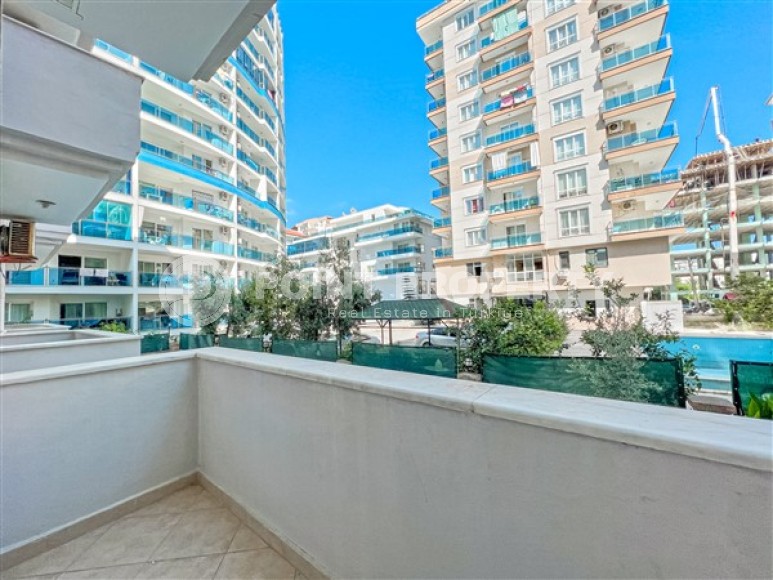 Уютная квартира с двумя спальными комнатами, в шаговой доступности от Средиземного моря, в районе города Аланья - Махмутлар-id-5493-фото-9