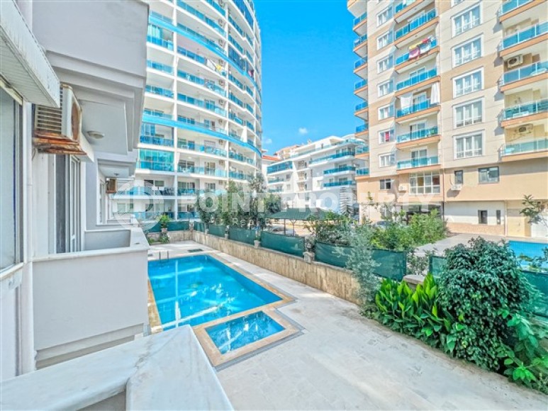 Уютная квартира с двумя спальными комнатами, в шаговой доступности от Средиземного моря, в районе города Аланья - Махмутлар-id-5493-фото-10