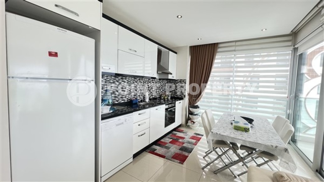 Apartment overlooking the Mediterranean Sea, 2+1 layout, on the first coastline in the elite area of Kestel-id-5495-photo-2