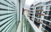 Apartment overlooking the Mediterranean Sea, 2+1 layout, on the first coastline in the elite area of Kestel-id-5495-photo-12