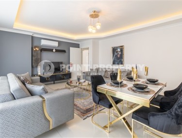 Апартаменты с новым ремонтом, стильным современным дизайном, мебелью и бытовой техникой, в центре спокойного, благоустроенного района Аланьи - Тосмур-id-5499-фото-2