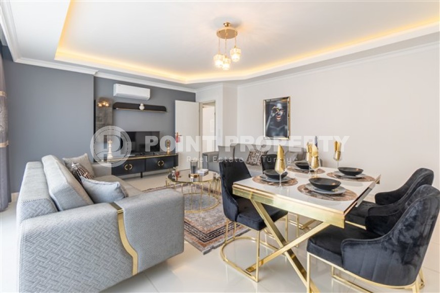 Апартаменты с новым ремонтом, стильным современным дизайном, мебелью и бытовой техникой, в центре спокойного, благоустроенного района Аланьи - Тосмур-id-5499-фото-2