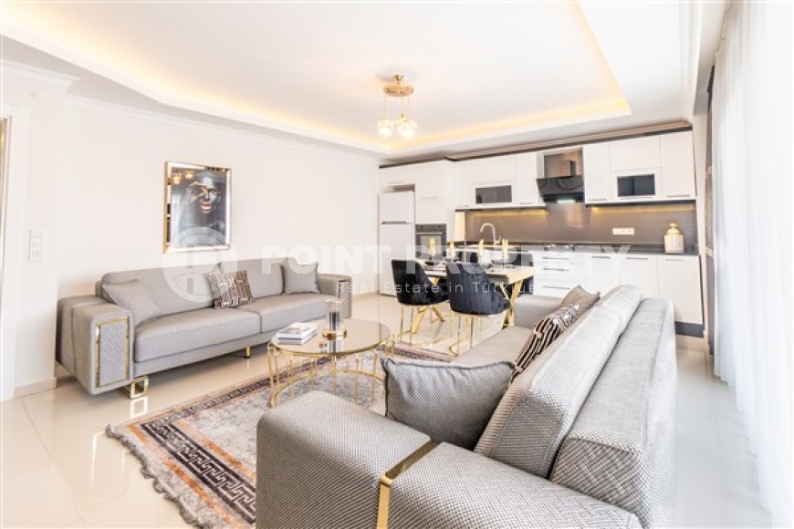 Апартаменты с новым ремонтом, стильным современным дизайном, мебелью и бытовой техникой, в центре спокойного, благоустроенного района Аланьи - Тосмур-id-5499-фото-3