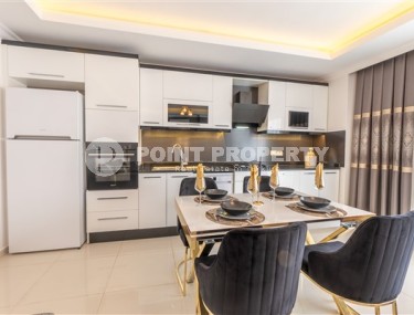 Апартаменты с новым ремонтом, стильным современным дизайном, мебелью и бытовой техникой, в центре спокойного, благоустроенного района Аланьи - Тосмур-id-5499-фото-4