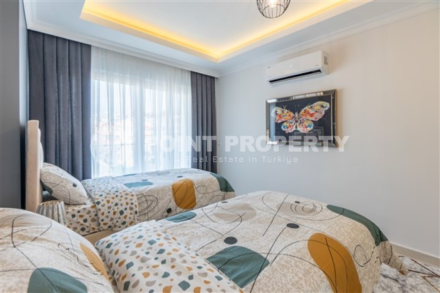 Апартаменты с новым ремонтом, стильным современным дизайном, мебелью и бытовой техникой, в центре спокойного, благоустроенного района Аланьи - Тосмур-id-5499-фото-7