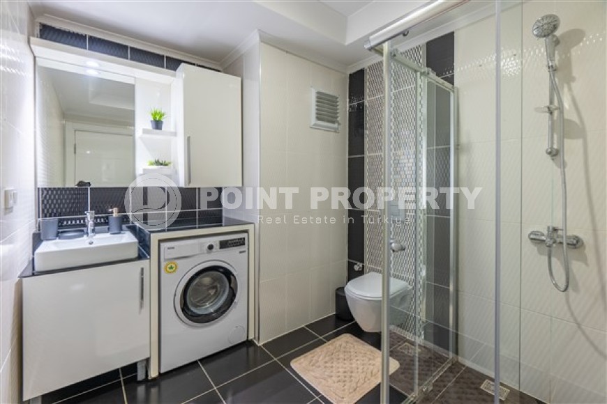 Апартаменты с новым ремонтом, стильным современным дизайном, мебелью и бытовой техникой, в центре спокойного, благоустроенного района Аланьи - Тосмур-id-5499-фото-8