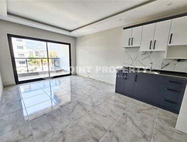 Современные апартаменты планировкой 1+1, в жилом комплексе 2023 года постройки, рядом с морем, в районе города Аланья - Каргыджак-id-5509-фото-2