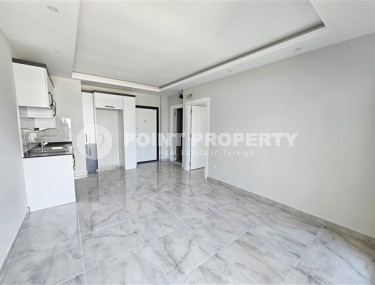 Современные апартаменты планировкой 1+1, в жилом комплексе 2023 года постройки, рядом с морем, в районе города Аланья - Каргыджак-id-5509-фото-3