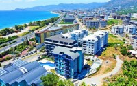 Современные апартаменты планировкой 1+1, в жилом комплексе 2023 года постройки, рядом с морем, в районе города Аланья - Каргыджак-id-5509-фото-15