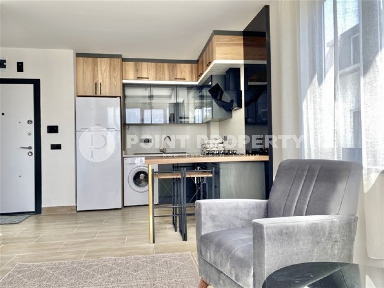Small apartment with modern renovation, 1+1 layout, in the Alanya - Mahmutlar area-id-5511-photo-2