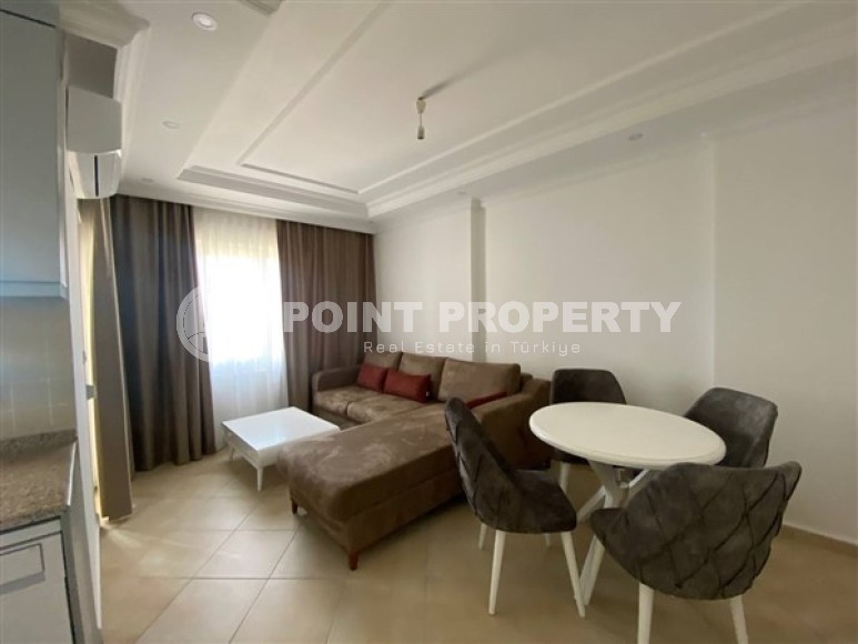 Меблированные апартаменты с одной спальной комнатой, с видом на Средиземное море, в районе Тосмур-id-5516-фото-2