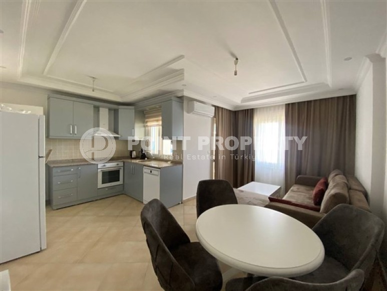 Меблированные апартаменты с одной спальной комнатой, с видом на Средиземное море, в районе Тосмур-id-5516-фото-4