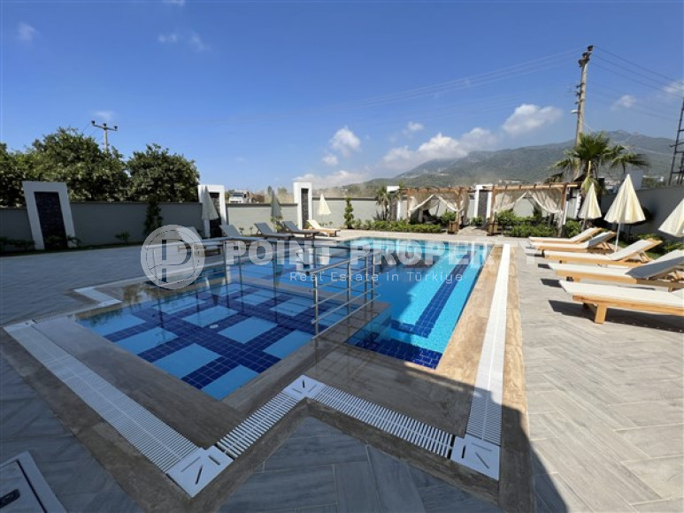 Apartment 1+1 in a residence with infrastructure at the final stage of construction in the Oba area, Alanya-id-1437-photo-3