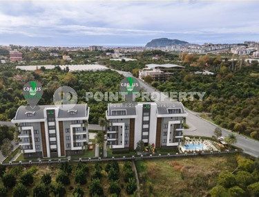 Apartment 1+1 in a residence with infrastructure at the final stage of construction in the Oba area, Alanya-id-1437-photo-4