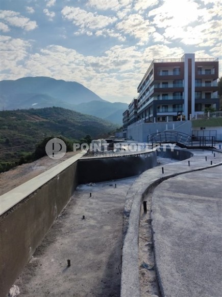 Apartments in a residence at the final stage of construction in a picturesque, prestigious area of Alanya - Kargicak-id-5527-photo-11