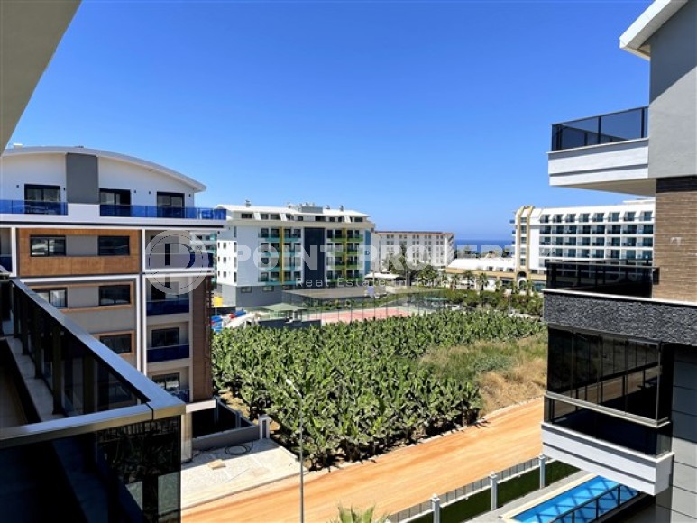 Современная двухуровневая квартира 3+1, общей площадью 180 м2, на 5-м этаже с мансардой в 100 метрах от моря-id-5562-фото-15