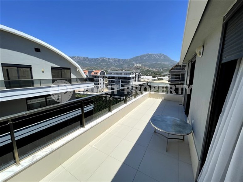 Современная двухуровневая квартира 3+1, общей площадью 180 м2, на 5-м этаже с мансардой в 100 метрах от моря-id-5562-фото-16