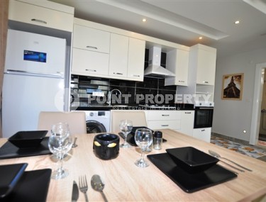 Стильная современная квартира 1+1, общей площадью 65 м2, в 400 метрах от моря в спокойном районе Аланьи - Каргыджак-id-5462-фото-3