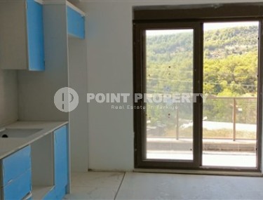 Квартира с чистовой отделкой в резиденции на завершающем этапе строительства, в районе Авсаллар-id-5570-фото-3