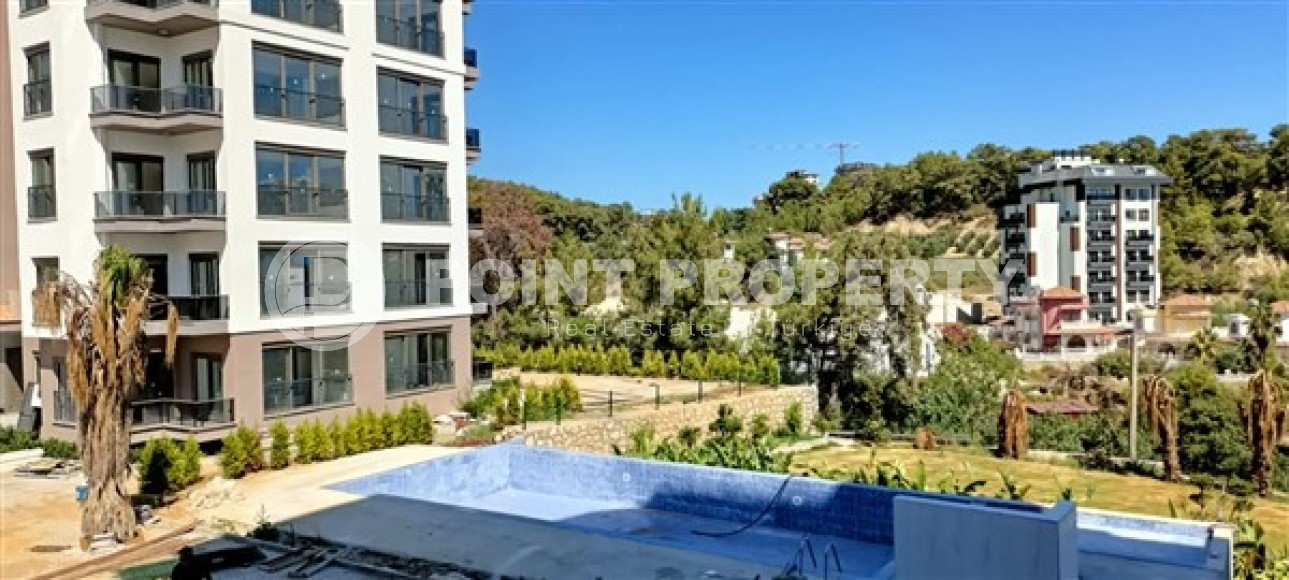 Квартира с чистовой отделкой в резиденции на завершающем этапе строительства, в районе Авсаллар-id-5570-фото-15