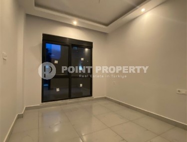 Апартаменты с чистовой отделкой в перспективном, активно развивающемся районе Аланьи - Авсаллар-id-5587-фото-3