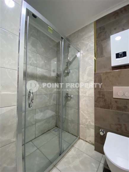 Апартаменты с чистовой отделкой в перспективном, активно развивающемся районе Аланьи - Авсаллар-id-5587-фото-5