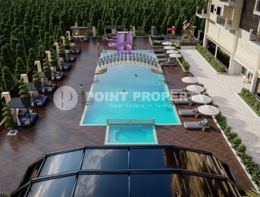 A new large-scale project - a residential complex with 176 apartments, 750 meters from the sea, in the center of Mahmutlar district-id-5589-photo-5