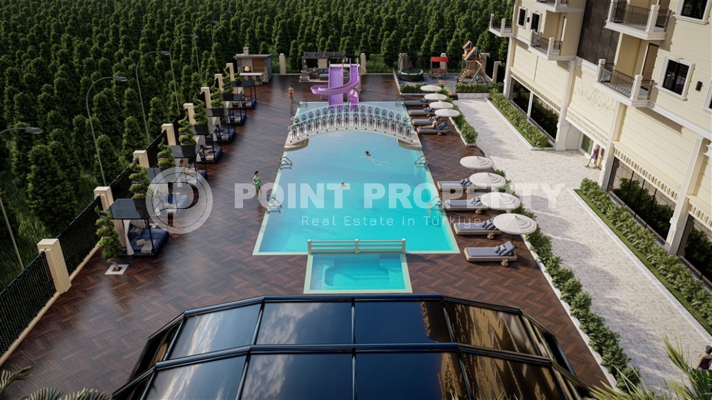 Новый масштабный проект - жилой комплекс на 176 квартир, в 750 метрах от моря, в центре района Махмутлар-id-5589-фото-5