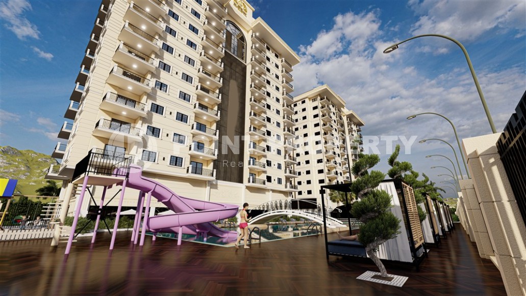 Новый масштабный проект - жилой комплекс на 176 квартир, в 750 метрах от моря, в центре района Махмутлар-id-5589-фото-8