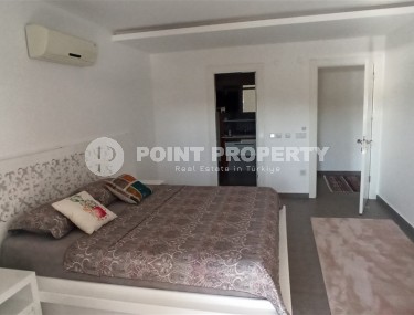 Двухуровневая квартира 2+1 с собственным садом, в 750 метрах от моря, в популярном районе Аланьи - Оба-id-5606-фото-4