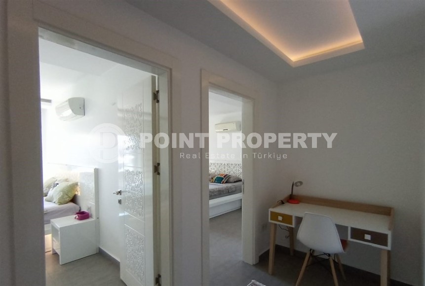 Двухуровневая квартира 2+1 с собственным садом, в 750 метрах от моря, в популярном районе Аланьи - Оба-id-5606-фото-7