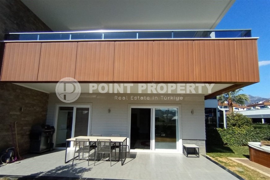 Двухуровневая квартира 2+1 с собственным садом, в 750 метрах от моря, в популярном районе Аланьи - Оба-id-5606-фото-12