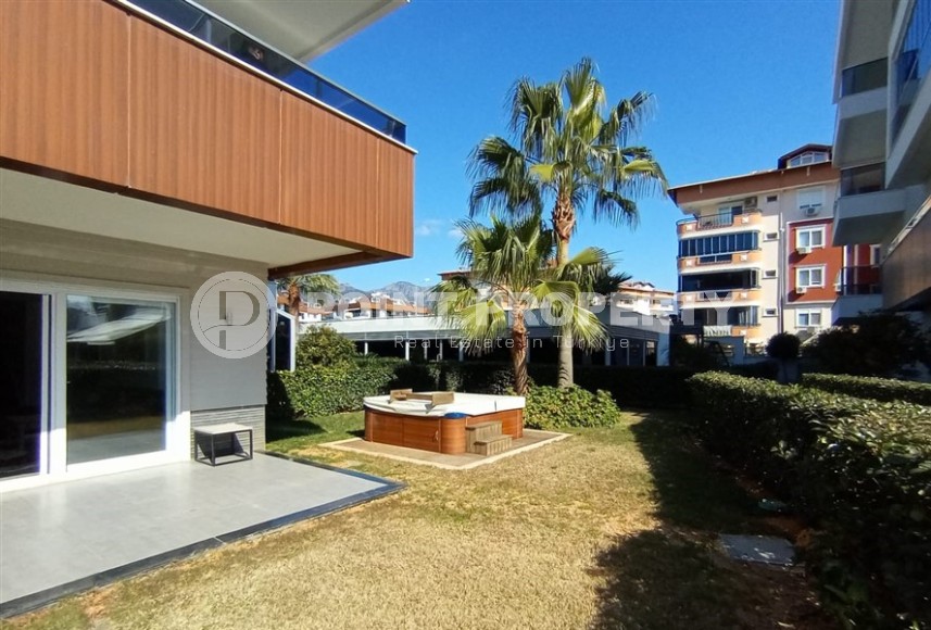 Двухуровневая квартира 2+1 с собственным садом, в 750 метрах от моря, в популярном районе Аланьи - Оба-id-5606-фото-13