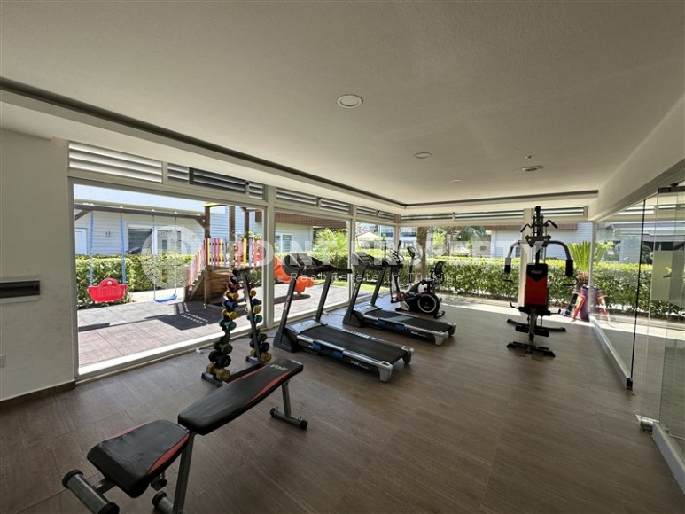 Двухуровневая квартира 2+1 с собственным садом, в 750 метрах от моря, в популярном районе Аланьи - Оба-id-5606-фото-15