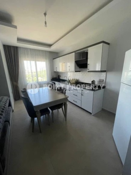 Дуплекс на 5-м этаже с мансардой, в жилом комплексе 2021 года постройки, в центре района Махмутлар-id-5608-фото-2