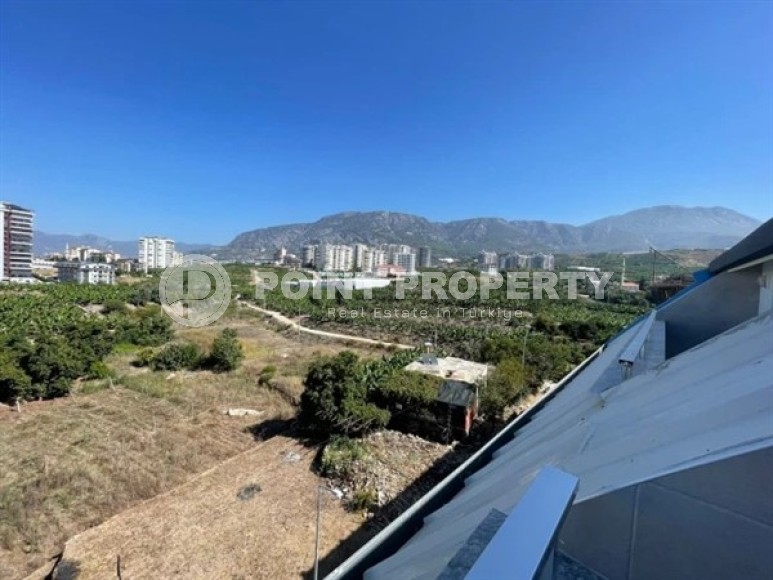 Дуплекс на 5-м этаже с мансардой, в жилом комплексе 2021 года постройки, в центре района Махмутлар-id-5608-фото-10