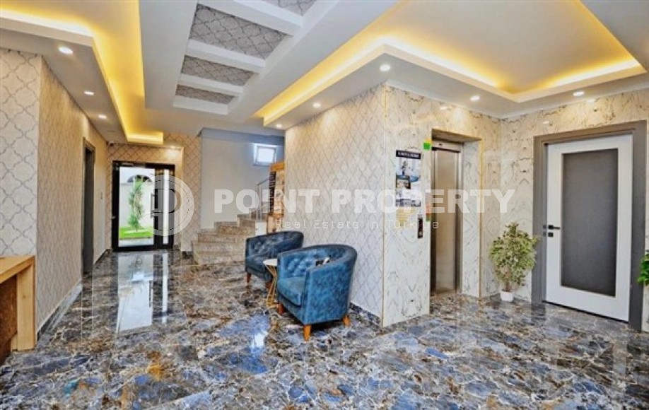 Дуплекс на 5-м этаже с мансардой, в жилом комплексе 2021 года постройки, в центре района Махмутлар-id-5608-фото-11