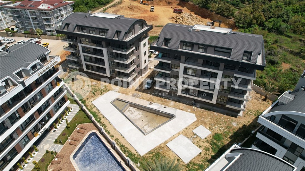 Апартаменты в жилом комплексе на финальной стадии строительства в спокойном, комфортабельном районе Аланьи - Верхняя Оба-id-5610-фото-14