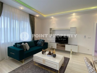 Comfortable apartment with modern design, stylish furniture and appliances, within walking distance from the center of Mahmutlar-id-5611-photo-1