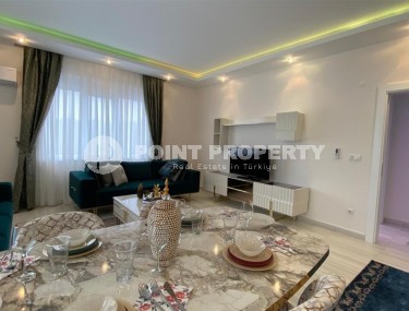 Comfortable apartment with modern design, stylish furniture and appliances, within walking distance from the center of Mahmutlar-id-5611-photo-2