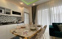 Comfortable apartment with modern design, stylish furniture and appliances, within walking distance from the center of Mahmutlar-id-5611-photo-3
