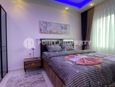 Comfortable apartment with modern design, stylish furniture and appliances, within walking distance from the center of Mahmutlar-id-5611-photo-4