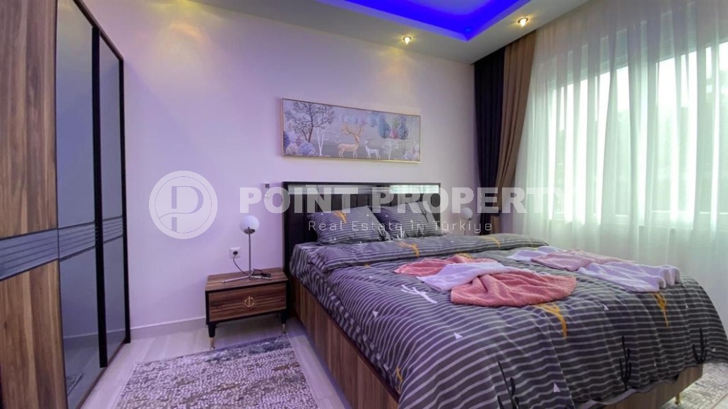 Comfortable apartment with modern design, stylish furniture and appliances, within walking distance from the center of Mahmutlar-id-5611-photo-4