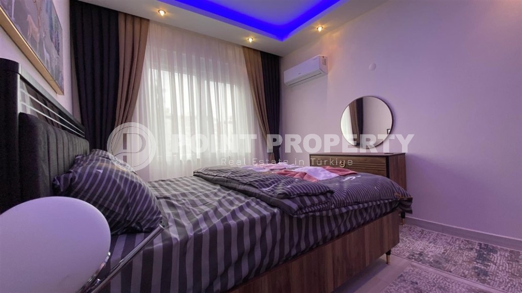 Comfortable apartment with modern design, stylish furniture and appliances, within walking distance from the center of Mahmutlar-id-5611-photo-5