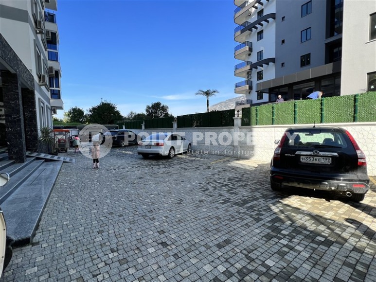 Comfortable apartment with modern design, stylish furniture and appliances, within walking distance from the center of Mahmutlar-id-5611-photo-17