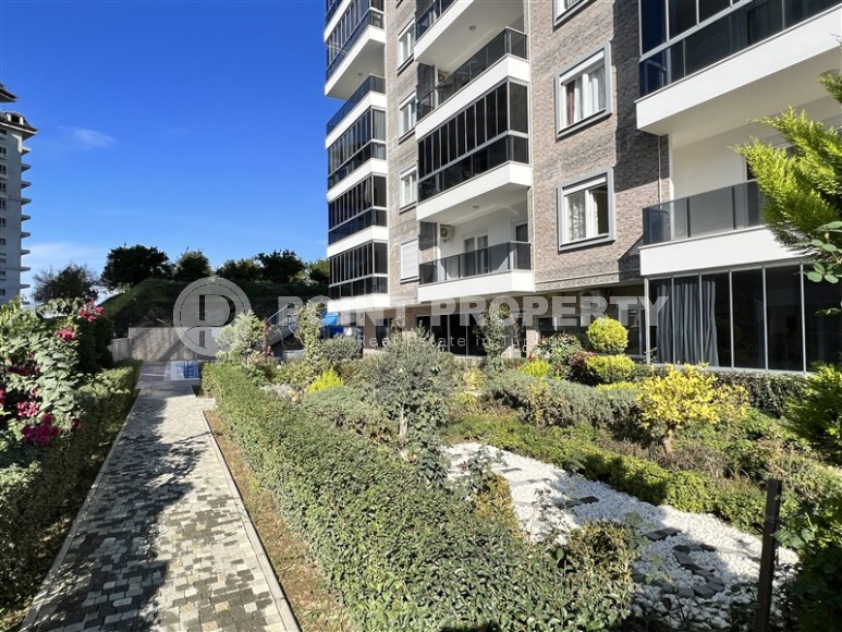 Comfortable apartment with modern design, stylish furniture and appliances, within walking distance from the center of Mahmutlar-id-5611-photo-18