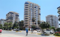 Apartments on the first line from the sea, in a modern, developed area of Alanya - Mahmutlar-id-5633-photo-1