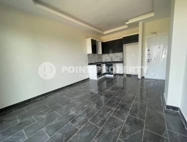 A small new apartment with a fine finish 50 meters from the sea, in the center of a picturesque, environmentally friendly area of Alanya - Demirtas-id-5637-photo-2