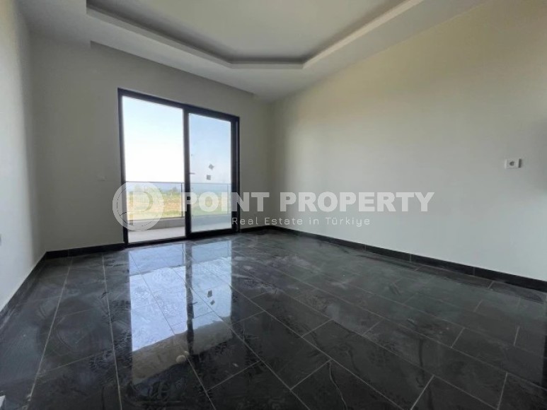 A small new apartment with a fine finish 50 meters from the sea, in the center of a picturesque, environmentally friendly area of Alanya - Demirtas-id-5637-photo-5