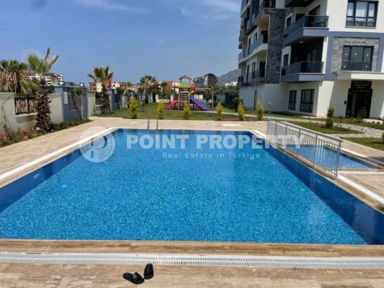 A small new apartment with a fine finish 50 meters from the sea, in the center of a picturesque, environmentally friendly area of Alanya - Demirtas-id-5637-photo-11